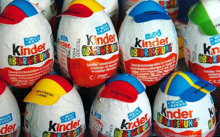 (dpa) - Rows of kinder surprise eggs are decorated with caps displaying different national flags on the occasion of this year's 28th Olympic Games in Potsdam, Germany, 30 March 2004. 
