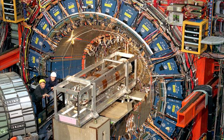 TO GO WITH AFP STORY by Mira Oberman
In this undtated image release by Fermilab, Scientists work at the three-story, 6,000-ton CDF (Collider Detector at Fermilab) in the Fermi National Accelerator Laboratory (Fermilab), located just outside Batavia, Illinois, near Chicago. 