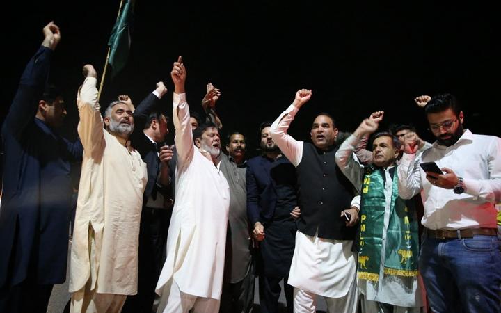 ISLAMABAD, PAKISTAN - APRIL 7: Supporters of opposition parties celebrate after Pakistanâs top court set aside the deputy speaker's ruling to Prime Minister Imran Khan and the house of parliament, in Islamabad, Pakistan on April 7, 2022.