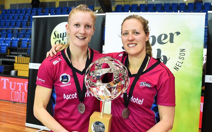 Steel vice captain Shannon Francois and Captain Wendy Frew with the trophy after winning the 2017 Super Club Netball Final against the Northern Mystics. 