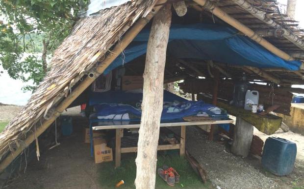 The 34 asylum seekers lived in a traditional hut on the docks of Yap after their boat sank