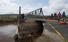 A bridge outside the Vanuatu capital of Port Vila damaged by Cyclone Pam.