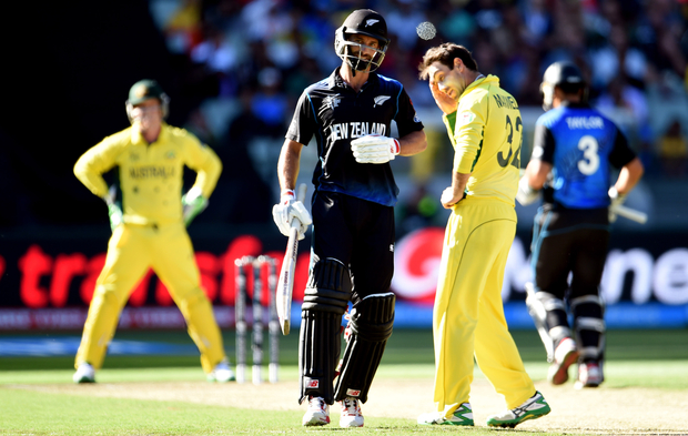 Grant Elliott makes his 50 in the final of the Cricket World Cup against Australia.