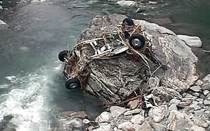 Part of the couple's vehicle found in the Haast River.