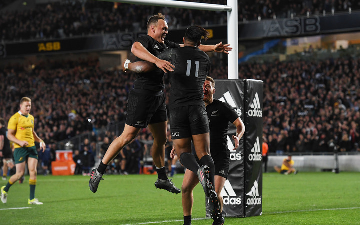 Julia Savea and teammates celebrate his try in the record-setting match against the Wallabies. 