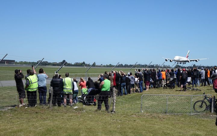 Hundreds of plane-spotters were at Christchurch Airport to watch the first scheduled arrival of the Airbus A380 at the airport.
