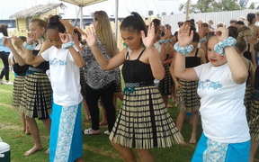 Students warm up for their performance at the Pasifika in the Bay Festival in the Bay of Plenty. 