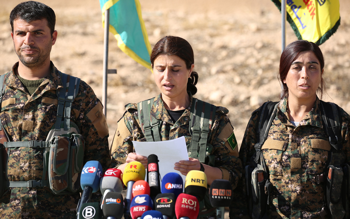 Jihan Sheikh Ahmed, a spokeswoman for the Syrian Democratic Forces (SDF), holds a news conference in the town of Ain Issa, some 50km north of Raqqa on 6 November 2016. 