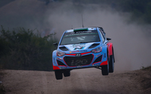 New Zealander driver Hayden Paddon steers his Hyundai i20 WRC with co-driver John Kennard during the WRC Rally Argentina on 25 April. 