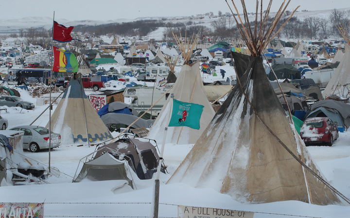 Snow covers Oceti Sakowin Camp near the Standing Rock Sioux Reservation on November 30, 2016 outside Cannon Ball, North Dakota. Native Americans and activists from around the country have been gathering at the camp for several months trying to halt the construction of the Dakota Access Pipeline. 