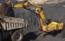 Digger loads up a truck at Stockton Coal Mine.