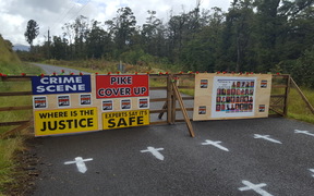A makeshift checkpoint set up on the road to Pike River Mine by some of the families of the 29 men who died. 