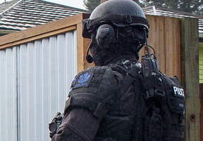Armed police officers during an operation.
