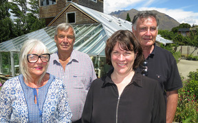 Jill and Dick Jardine with Otago University's Harlene Hayne and John Ward outside the Remarkables homestead the Jardines are donating to the university. Picture /