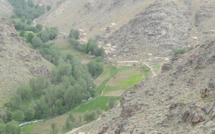 The authors said this photo showed the village of Naik in summer. They said the other village that was attacked was nearby, about 1km behind the ridge on the left of the photo. 