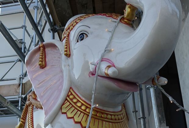 Large elephant statues adorn the main entrance.