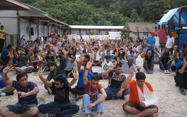 Refugees protest on Nauru against offshore processing in defiance of a new law requiring 7 days notice of a protest.
