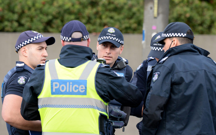 Police at the scene the siege in the suburb of Brighton on 6 June.