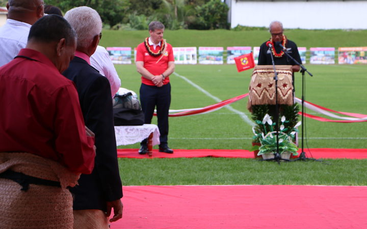 Tonga's prime minister 'Akilisi Pohiva (right) in an All Blacks jersey speaking at the reopening of Teufaiva Stadium in Nuku'alofa as New Zealand prime minister Bill English, in an 'Ikale Tahi jersey looks on. 16 June 2017