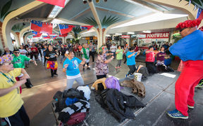 People take part in an open group Zumba session held in Mangere Town Centre