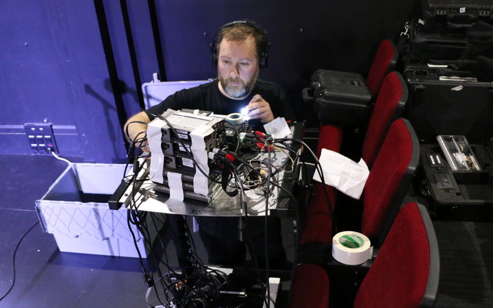 Engineer Marc Chesterman sets up his sound gear to record "Vanilla Miraka" at BATS Theatre