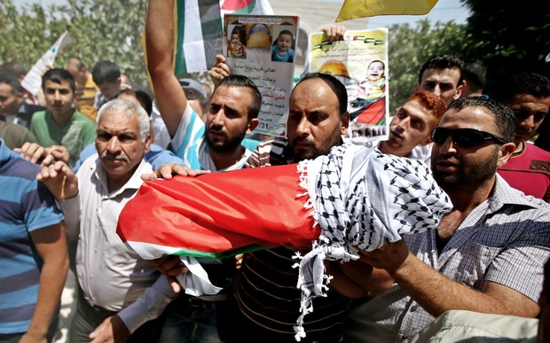 Anger at the funeral of 18-month-old Ali Saad Dawabsha.