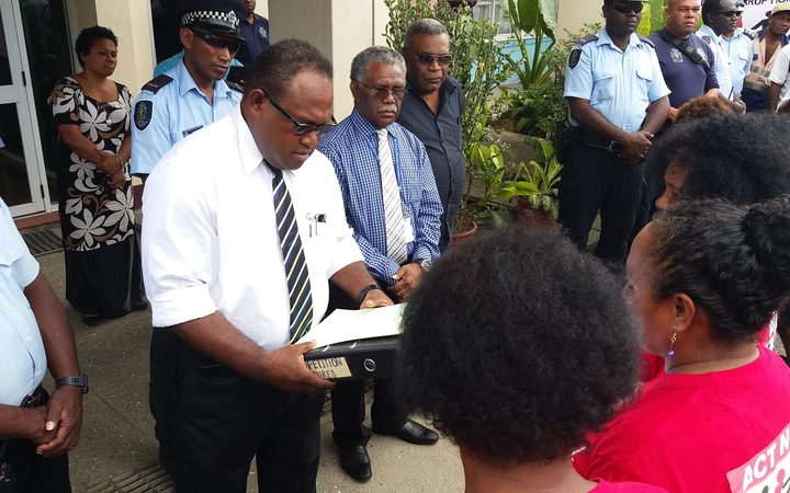 Solomon Islands' acting prime minister Manasseh Maelanga receives anti-corruption petition from civil society representatives. September 2017