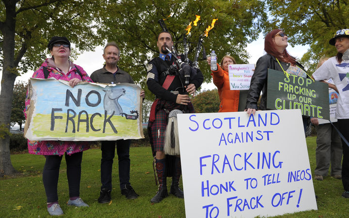 Scottish demonstrators protest against Ineos, which holds fracking exploration licences across 1800 square km of the country