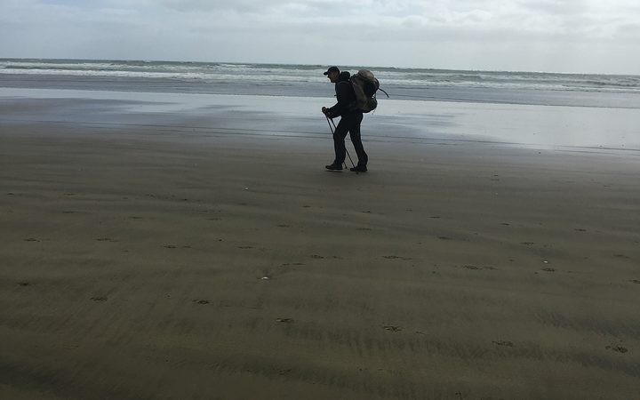 An image of a fellow trail walker in the distance on 90 Mile Beach.