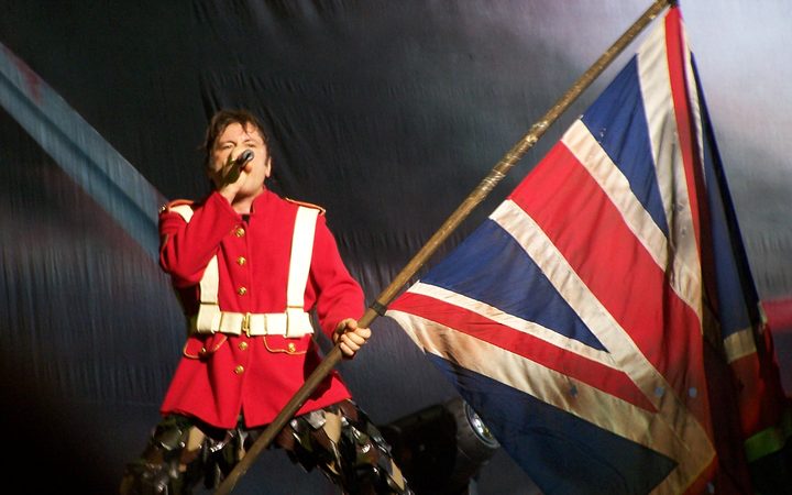 Bruce Dickinson on stage with iron Maiden.