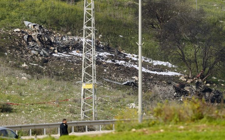 The remains of an Israel F-16 that crashed after coming under fire by Syrian air defences during attacks against "Iranian targets" in the war-torn country.