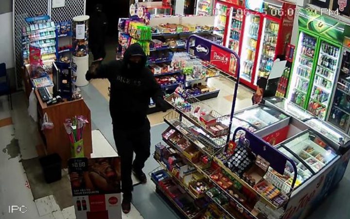 Video footage shows one of the offenders inside Aberdeen Superette.