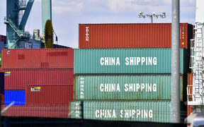 Containers are stacked on a vessel at the Port of Long Beach in Long Beach, California on July 6, 2018, including some from China Shipping, a conglomerate under the direct administration of China's State Council. 