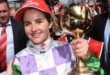 Michelle Payne celebrates after winning the Melbourne Cup on Prince of Penzance at Flemington Racecourse in Melbourne, Tuesday, Nov. 3, 2015.
