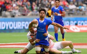 Gordon Langkilde is tackled during the Vancouver Sevens in March.