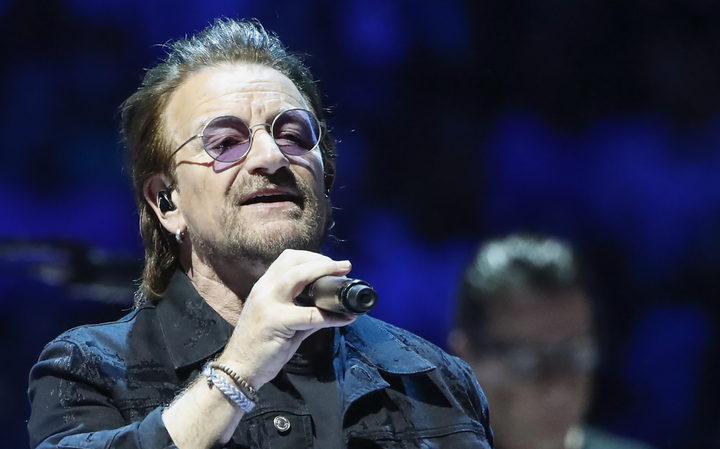 Bono of the Irish rock band U2 performances during "Experience + Innocence" tour at the United Center in Chicago on May 23, 2018. / AFP PHOTO / Kamil Krzaczynski