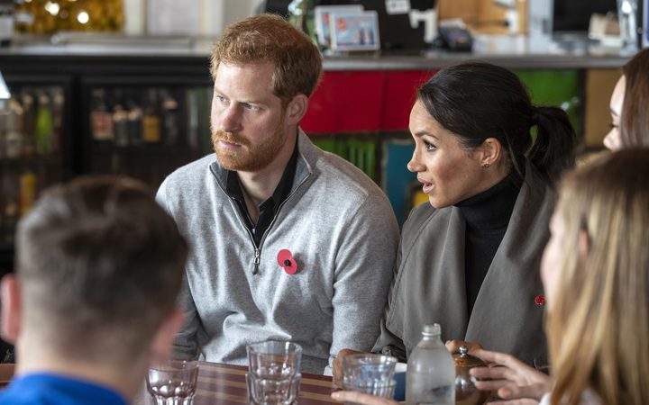 Prince Harry and his wife Meghan meet with representatives of mental health projects at Maranui cafe in Wellington.