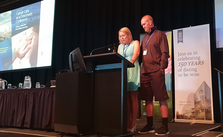 Melissa Vining fought back sobs as she told 400 cancer specialists in Wellington what her family has been through after her husband's terminal bowel cancer diagnosis.