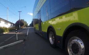 Bus close to cyclist