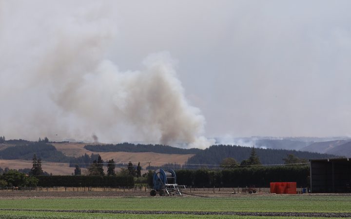 Clouds of smoke are seen rising from the bush fire area at Pigeon Valley this afternoon.