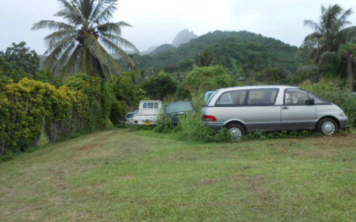 Car wrecks on the side of the road in Rarotonga 
