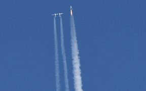 Virgin Galactic's VSS Unity launches for a suborbital test flight on December 13, 2018, in Mojave, California. - Virgin Galactic marked a major milestone on Thursday as its spaceship made it to a peak height, or apogee, of(82.7 kilometers), 