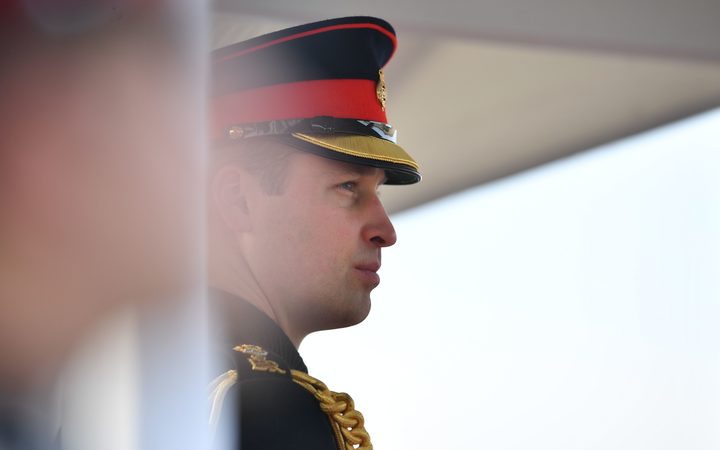 Britain's Prince William, Duke of Cambridge representing Britain's Queen Elizabeth II inspects the graduating officer cadets during the Sovereign's Parade at the Royal Military Academy, Sandhurst, southwest of London on December 14, 2018.