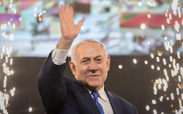 10 April 2019, Israel, Tel Aviv: Benjamin Netanyahu, Prime Minister of Israel, beckons supporters after the polling stations have been closed. Several hours after the closure of the polling stations in Israel, only partial results were available on the night of Wednesday. 