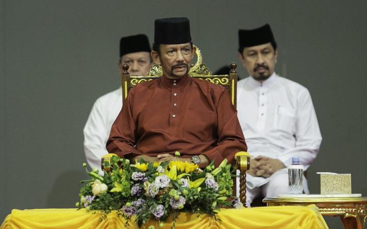 Brunei's Sultan Hassanal Bolkiah (C) attends an event in Bandar Seri Begawan on April 3, 2019. 