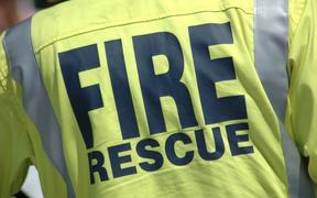14915103 - fireman wearing a fire rescue jacket