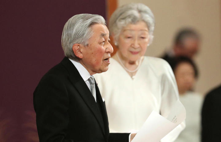 Japan's Emperor Akihito, accompanied by Empress Michiko, speaks during the ceremony of his abdication in front of other members of the royal families and top government officials at the Imperial Palace in Tokyo on 30 April, 2019.