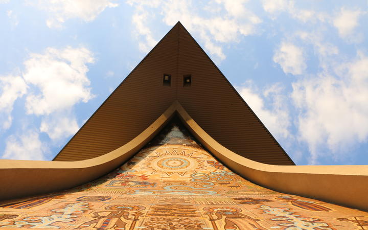 Intricate artwork displayed on the facade of the Papua New Guinea parliament building in Port Moresby.