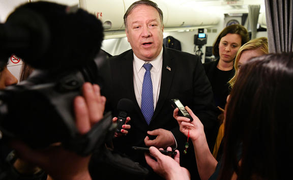 US Secretary of State Mike Pompeo speaks to reporters in flight after a previously unannounced trip to Baghdad on May 8, 2019