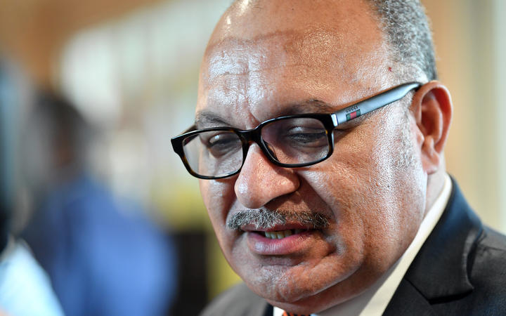 PNG police withdraw former PM's arrest warrant